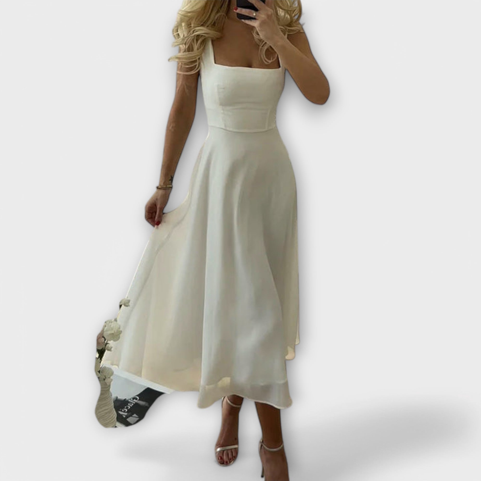 Elegantné bezrukávové šaty